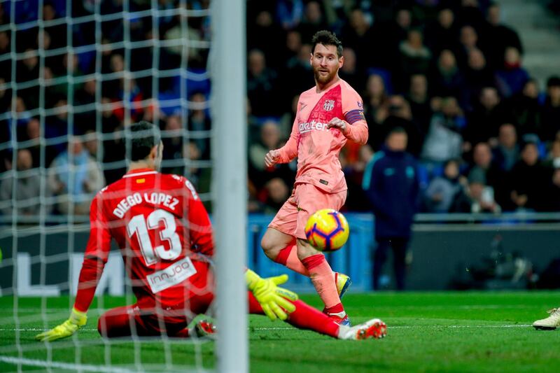 Lionel Messi watches his attempt on goal get saved. AP Photo