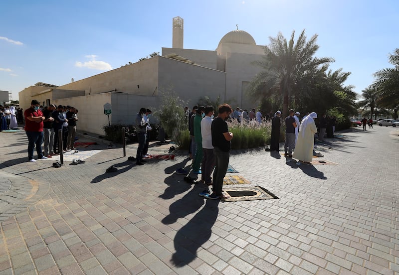 People attending Friday prayers at a mosque in Sustainable City, Dubai. Prayers started at around 1.15pm. Chris Whiteoak / The National