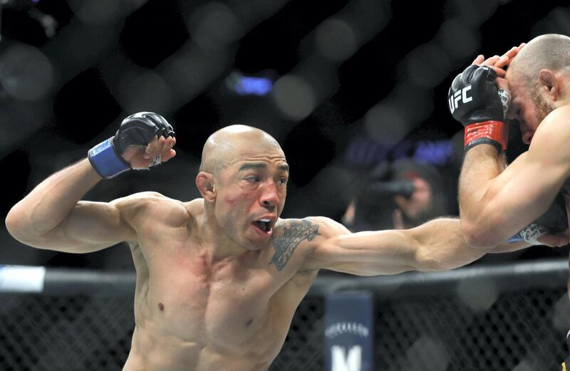LAS VEGAS, NEVADA - DECEMBER 14: Jose Aldo (L) punches Marlon Moraes in their bantamweight fight during UFC 245 at T-Mobile Arena on December 14, 2019 in Las Vegas, Nevada. Moraes won the fight by split decision.   Steve Marcus/Getty Images/AFP