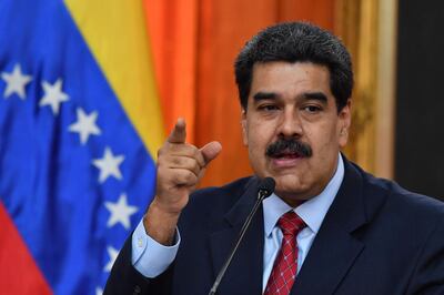 (FILES) In this file photo taken on January 25, 2019 Venezuelan President Nicolas Maduro offers a press conference in Caracas. Venezuelan President Nicolas Maduro pledged on January 28 to retaliate against the United States for its new sanctions on state oil company PDVSA. / AFP / Yuri CORTEZ
