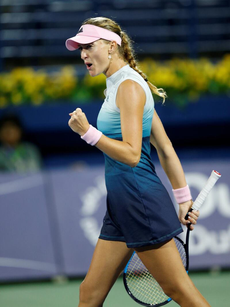 Kristina Mladenovic of France celebrates winning her second round match against Naomi Osaka of Japan at the Dubai Duty Free Tennis WTA Championships 2019 in Dubai.  EPA