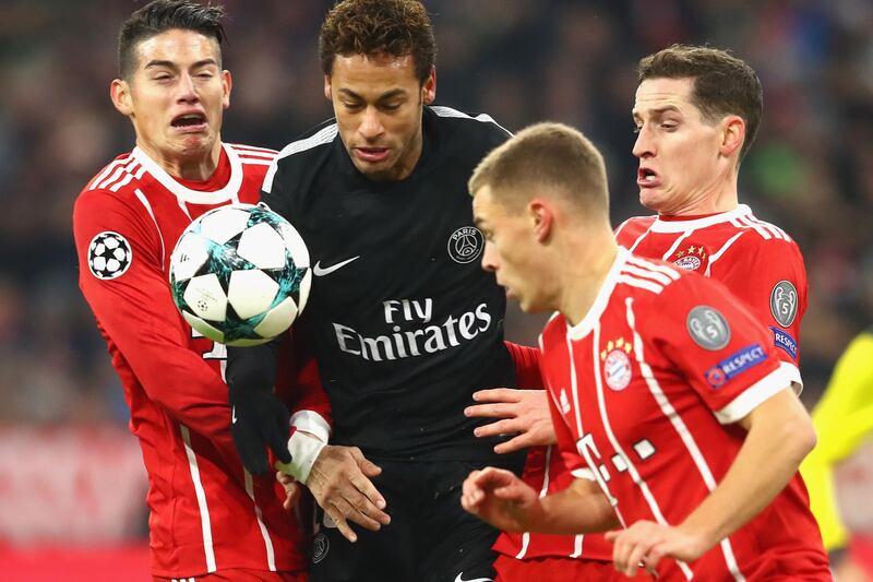 MUNICH, GERMANY - DECEMBER 05:  (L-R)  James Rodriguez of FC Bayern Muenchen battles for the ball with Neymar of PSG Paris and Joshua Kimmich and Sebastian Rudy of FC Bayern Muenchen during the UEFA Champions League group B match between Bayern Muenchen and Paris Saint-Germain at Allianz Arena on December 5, 2017 in Munich, Germany.  (Photo by Alexander Hassenstein/Bongarts/Getty Images)