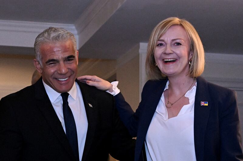 British Prime Minister Liz Truss and Israeli Prime Minister Yair Lapid hold a meeting. Reuters