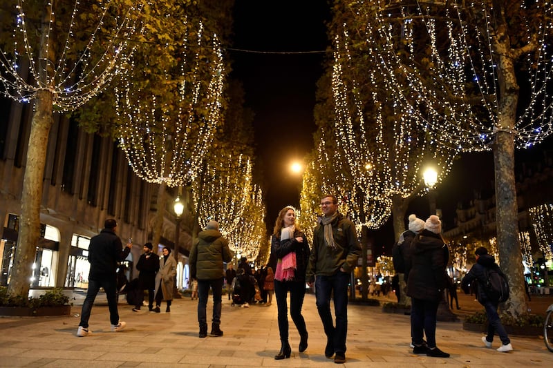 The lights on the famed avenue will be turned off at the earlier time of 11.45pm, rather than 2am, from now until further notice to help save energy. AFP