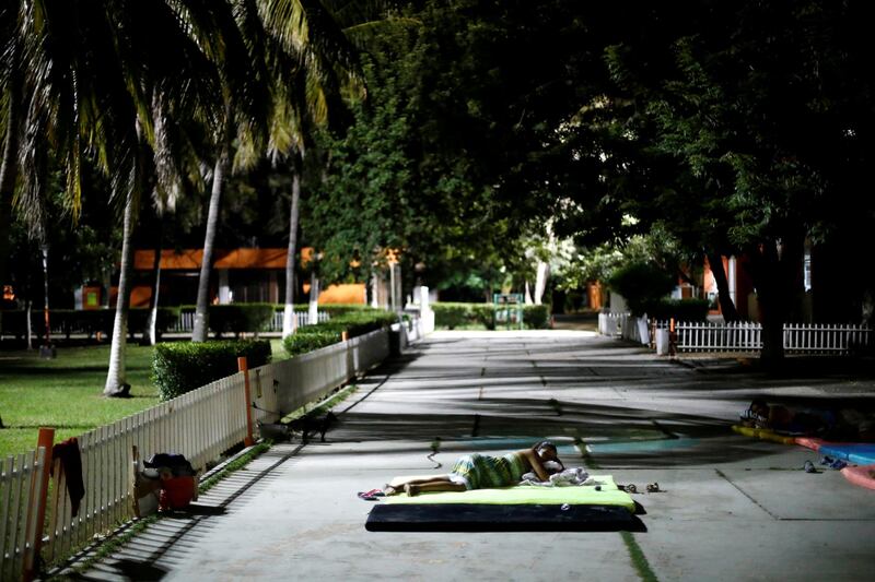 A resident rests at a shelter after an earthquake struck off the southern coast of Mexico. Edgard Garrido / Reuters
