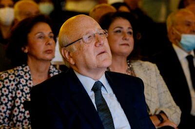 Lebanese Prime Minister Najib Mikati attends a press conference in Beirut last week. Mikati has renewed his call for his information minister to resign. AP Photo