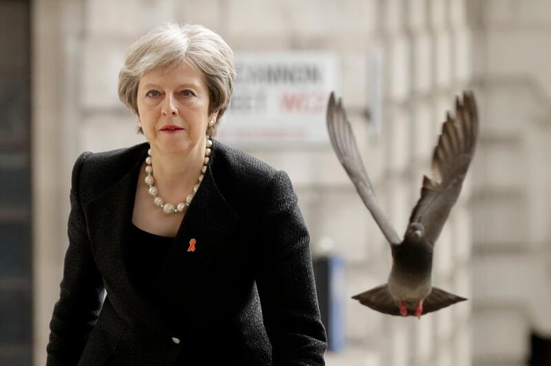 May, pictured here in April 2018, says she will step down as Conservative leader on June 7, 2019. AP Photo