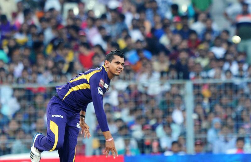 Kolkata Knight Riders cricketer Sunil Narine bowls during the IPL Twenty20 cricket match between Kolkata Knight Riders and Kings XI Punjab at The Eden Gardens in Kolkata on April 15, 2012. RESTRICTED TO EDITORIAL USE. MOBILE USE WITHIN NEWS PACKAGE. AFP PHOTO/Dibyangshu SARKAR
