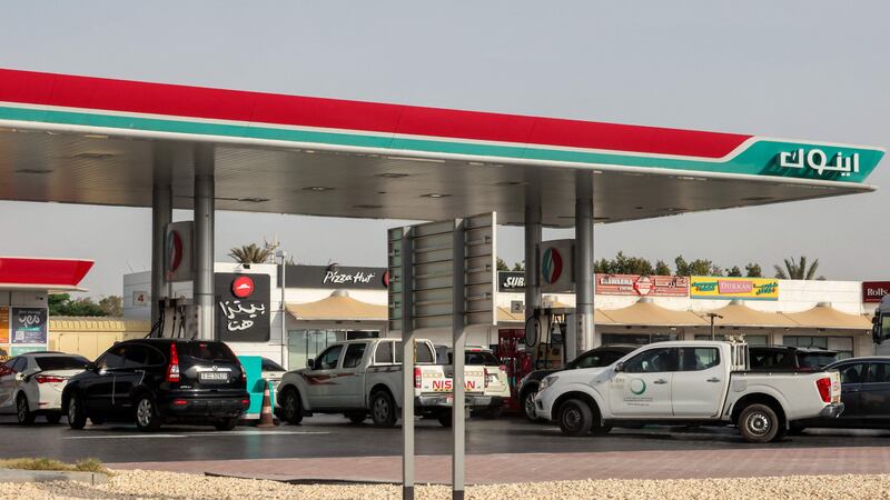 Vehicles queue to refuel at a petrol station in Dubai. AFP