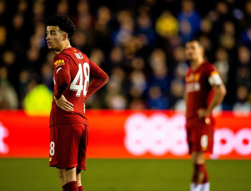 Liverpool's Curtis Jones looks dejected. EPA