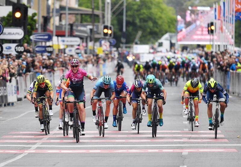 Italian rider Simona Frapporti (BePink Team) raises her arms after winning Stage 4 of the Adelaide Classic Street Circuit at the Women's 2020 Tour Down Under, on Sunday, January 19. EPA