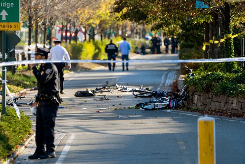 Bicycles and debris lay on a bike path after a motorist drove onto the path near the World Trade Center memorial, striking and killing several people Tuesday, Oct. 31, 2017, in New York. (AP Photo/Craig Ruttle)