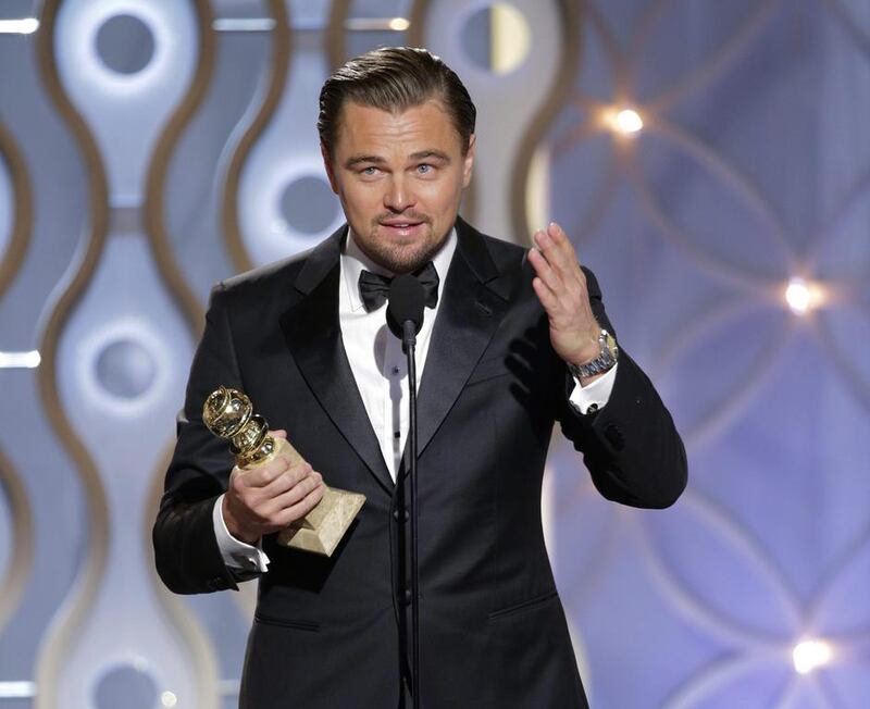 Leonardo DiCaprio accepting the award for best actor in a motion picture comedy for his role in The Wolf of Wall Street. AP