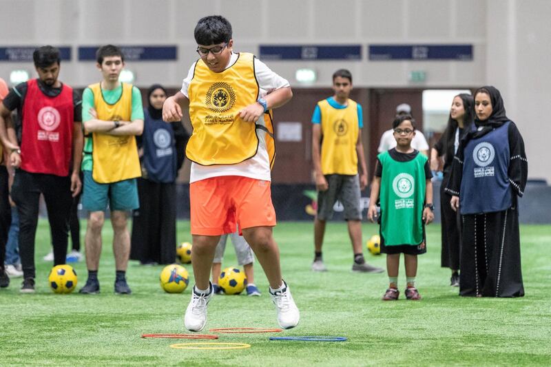 DUBAI, UNITED ARAB EMIRATES. 23 JULY 2018. Special Olympics are running a summer camp at Dubai Sports World for young people with intellectual disabilities at Dubai World Trade Centre. So far over 40 people with intellectual disabilities have taken part in weekly training sessions including football, basketball and cycling alongside ambassadors and members of the Special Olympics UAE team. (Photo: Antonie Robertson/The National) Journalist: Standalone. Section: National.