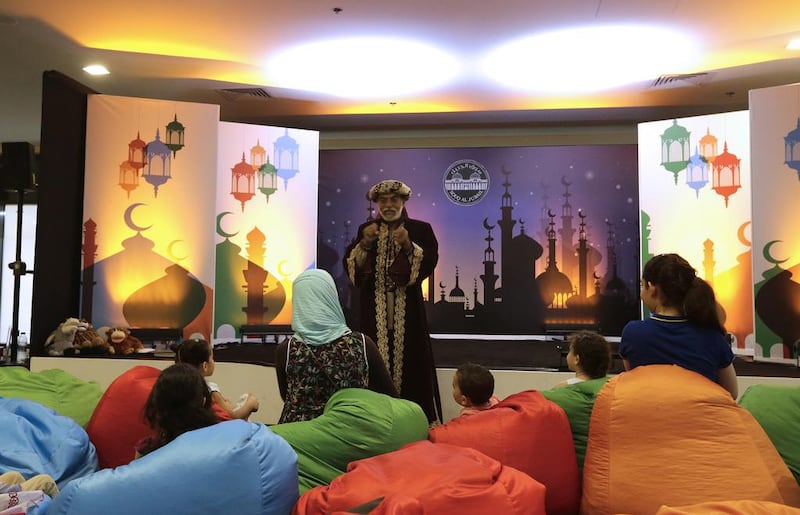Ahmed Yousef weaves special tales during Ramadan at Souq Al Jubail.  Jeffrey E Biteng / The National 