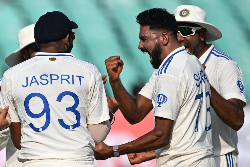 India's Mohammed Siraj celebrates with teammates after taking the wicket of England's Ollie Pope. AFP