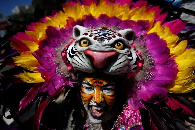 A member of the Congo Reformado folk group poses for a portrait before a parade at the 12th International Festival of the Iberian Mask in Lisbon, Portugal. Rafael Marchante / Reuters / May 5, 2017