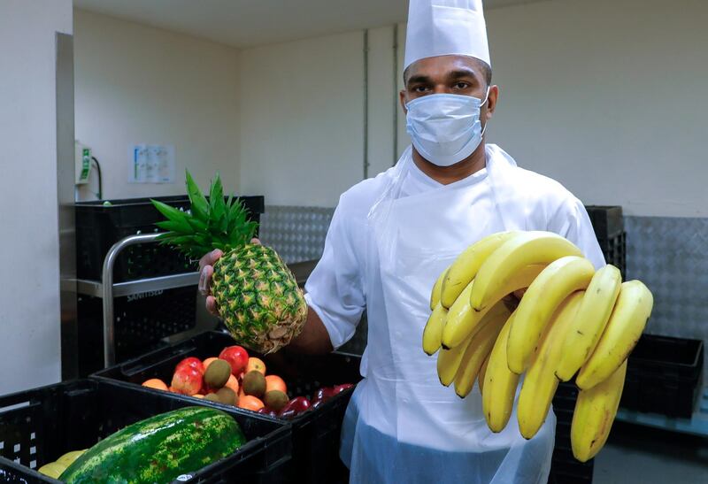 Abu Dhabi, United Arab Emirates, August 12, 2020.   
Media Tour at The Westin Abu Dhabi Golf Resort & Spa on how tourism officials are conducting the go safe certification for hotels against Covid-19.   Upul Jaysundra, a Junior Sous Chef makes sure all vegetables are thouroughly and safely washed using special solutions which are later checked by a paper color chart for satisfactory tolerances.
Victor Besa /The National
Section:  NA
Reporter:  Haneen Dajani