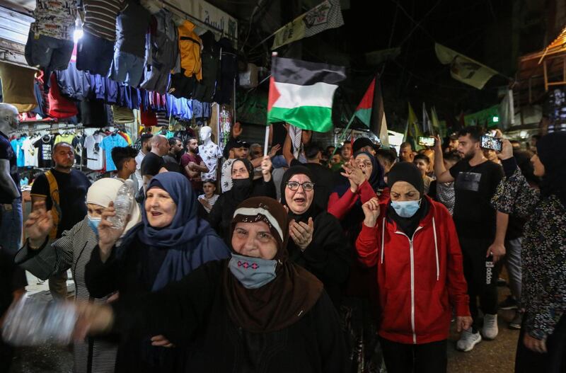 Supporters of Palestinian factions demonstrate in support of the Palestinians facing eviction in a Jerusalem neighbourhood, at Bourj Al Barajneh Palestinian camp in the southern suburb of Beirut, Lebanon. EPA