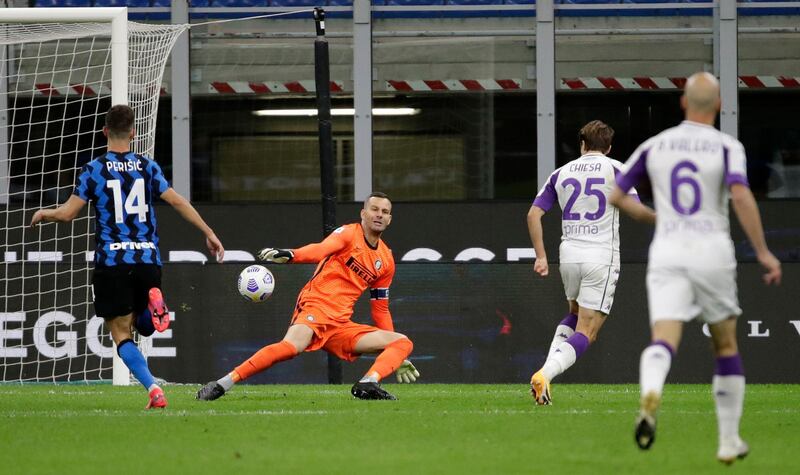 Fiorentina's Federico Chiesa, second right, scores his side's third goal. AP