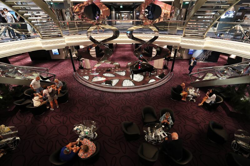 Passengers on the MSC Virtuosa embark in Dubai before the ship's journey to Abu Dhabi and Doha