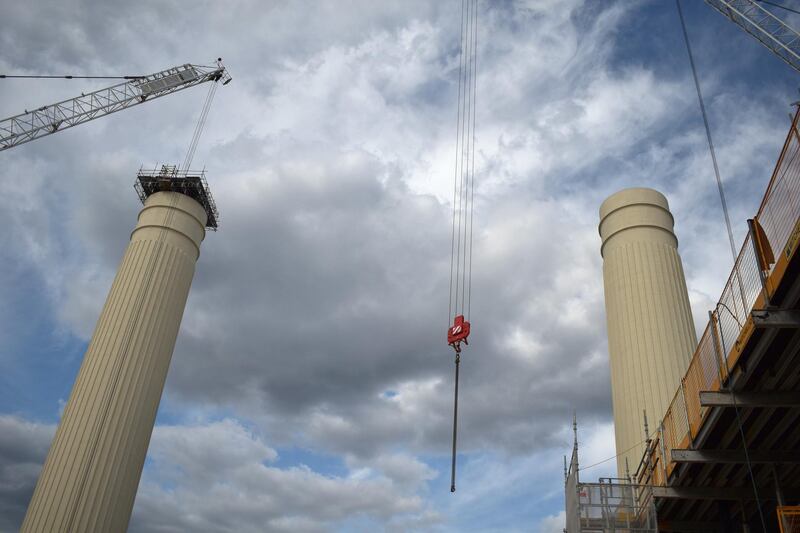 Battersea Power Station's legendary chimneys loom over London. Shafi Musaddique / The National