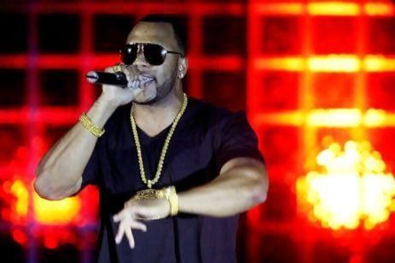 Flo Rida performs on stage. Matt Sayles / AP