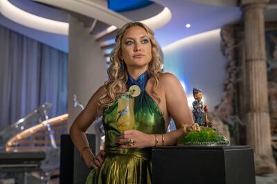 Kate Hudson as Birdie Jay in Glass Onion, with Amanzoe Villa 20's Acropolis-style columns in the background. Photo: Netflix 