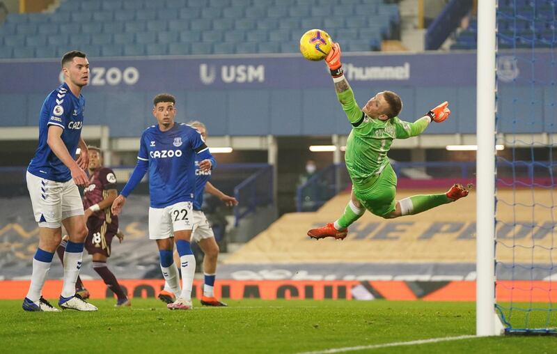 Everton goalkeeper Jordan Pickford saves a shot from Leeds United's Raphinha during the Premier League match at Goodison Park on Saturday, November 28. Leeds won the game 1-0. Reuters