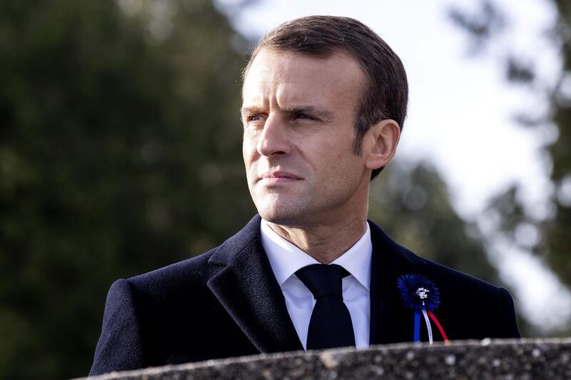 French president Emmanuel Macron looks on as he visits the Point X monument in Les Eparges, eastern France, on November 6, 2018, as part of ceremonies marking the centenary of the First World War.  The French President kicked off a week of commemorations for the 100th anniversary of the end of World War One, which is set to mix remembrance of the past and warnings about the present surge in nationalism around the globe.  / AFP / POOL / Etienne LAURENT
