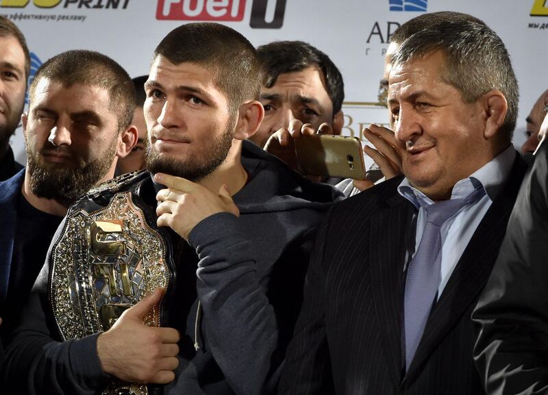 Khabib Nurmagomedov is joined by his father his father Abdulmanap. AFP