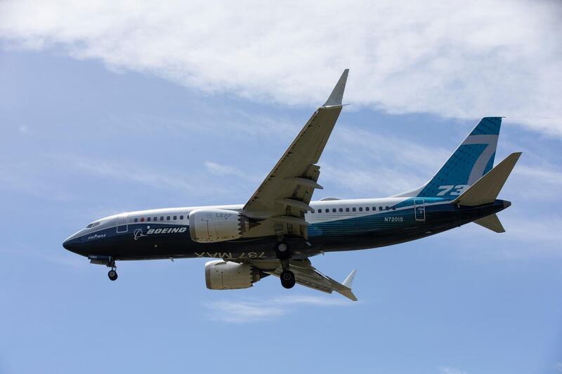 A Boeing 737 MAX airplane lands after a test flight at Boeing Field in Seattle, Washington, U.S. June 29, 2020. REUTERS/Karen Ducey