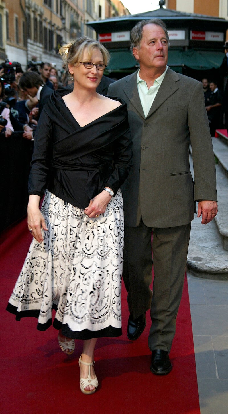 ROME, ITALY - MAY 16:  Meryl Streep and her husband Donald Gummer arrive at the inaugural ceremony of the Robert De Niro Sr. painting exhibition on May 16, 2005 in Rome, Italy.  (Photo by Giuseppe Cacace/Getty Images)