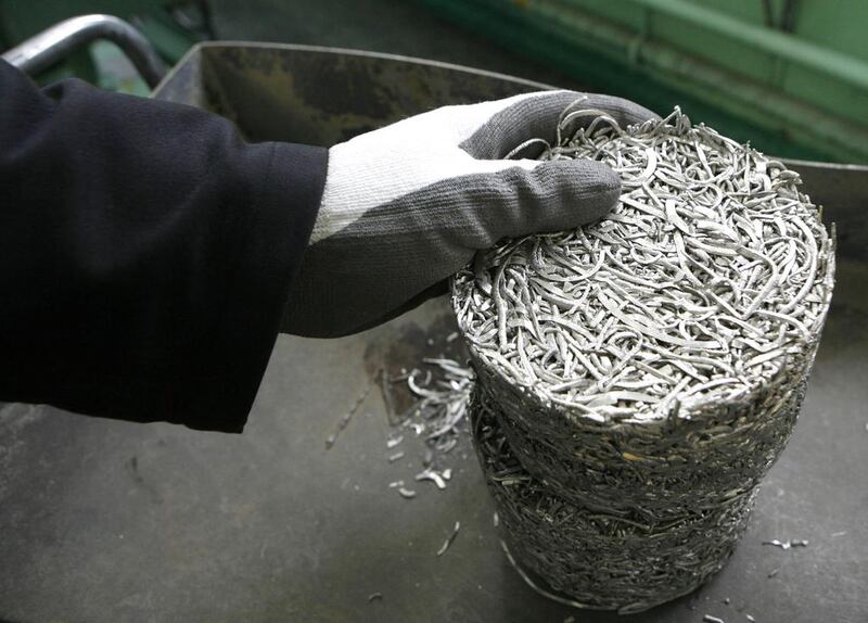 A worker processes a briquette of platinum shavings to cast ingots of 99.98 per cent pure platinum. By using more renewables, the miners may also ease pressure from investors wary of carbon-intensive industries as the shift from fossil fuels accelerates. Reuters