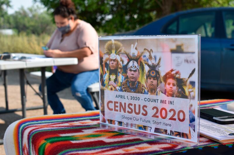 A sign promoting Native American participation in the US census is displayed in Lodge Grass, Montana. AP