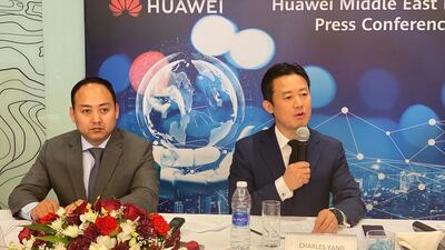 Charles Yang (R), Huawei’s Middle East president, and Li Xiangyu (L), Vice President of Huawei Middle East speak at a media briefing in Oman last year. Alkesh Sharma / The National 