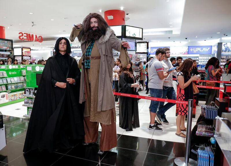 Fans cosplay as Harry Potter characters Professor Severus Snape and Hagrid at the Harry Potter and the Cursed Child book launch at the Mall of the Emirates. Victor Besa for The National