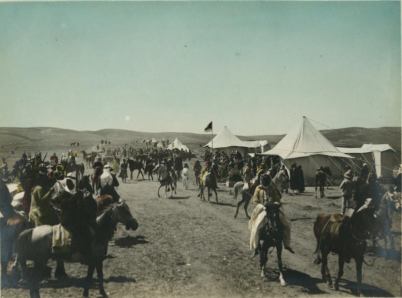 Arab men on horseback in line near tents, Amir Abdullah's camp, Amman. Meetings of British, Arab, and Bedouin officials in Amman, Jordan, April 1921. Courtesy Library of Congress, Prints & Photographs Division