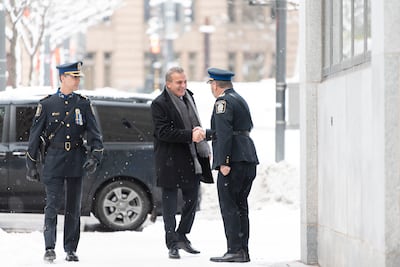 Montreal Police Chief Fady Dagher greets a uniformed officer. Photo: SPVM