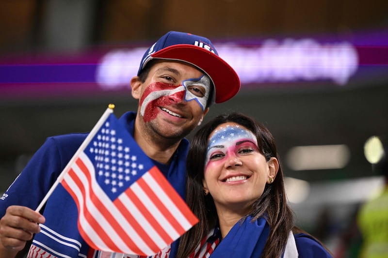 USA fans at their team's final group game. AFP