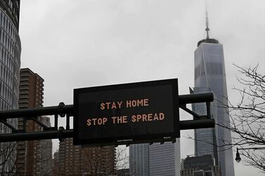 A traffic advisory sign on the West Side Highway instructs motorists to 'Stay Home Stop The Spread' in New York, New York, US. EPA