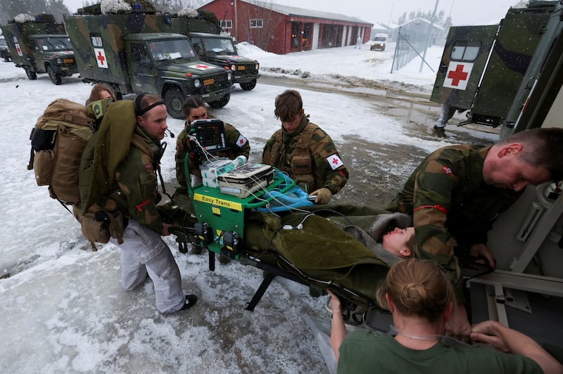 Swedish army medics simulate an operation at a field hospital during military exercises last year. Reuters