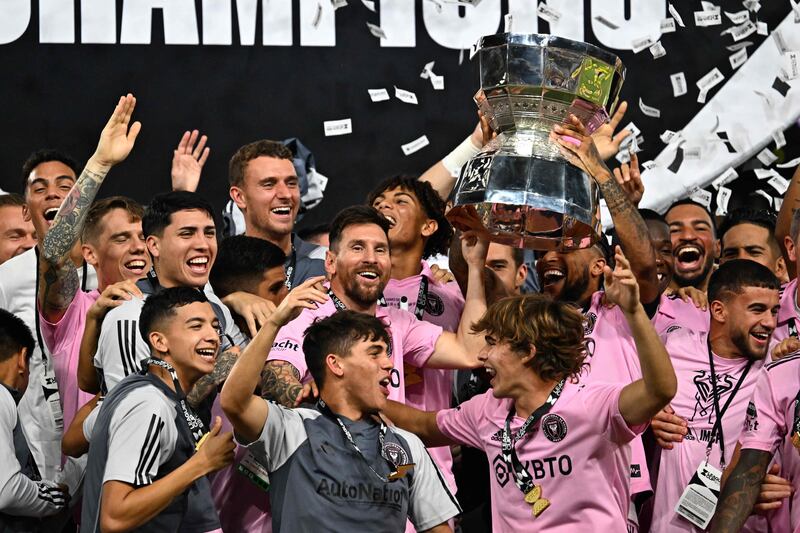 Lionel Messi and his Inter Miami teammates celebrate with the trophy after winning the Leagues Cup. AFP