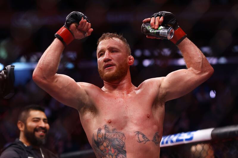 Justin Gaethje celebrates after his decision victory over Michael Chandler in their lightweight bout at UFC 268 on November 06, 2021 in New York City.    AFP