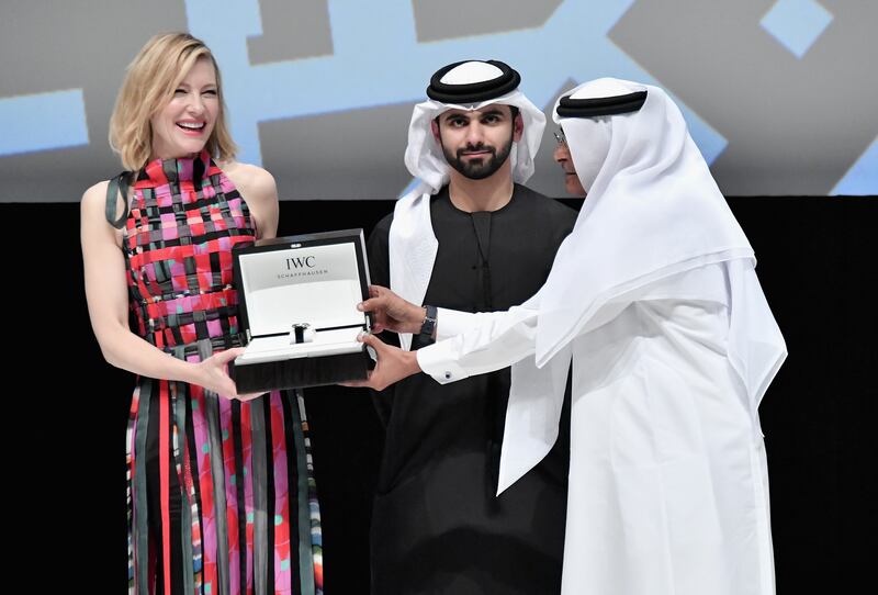 Cate Blanchett after receiving her honorary award with Sheikh Mansoor bin Mohammed bin Rashid Al Maktoum and Diff chairman Abdulhamid Juma at the Dubai International Film Festival in 2017. Getty Images 