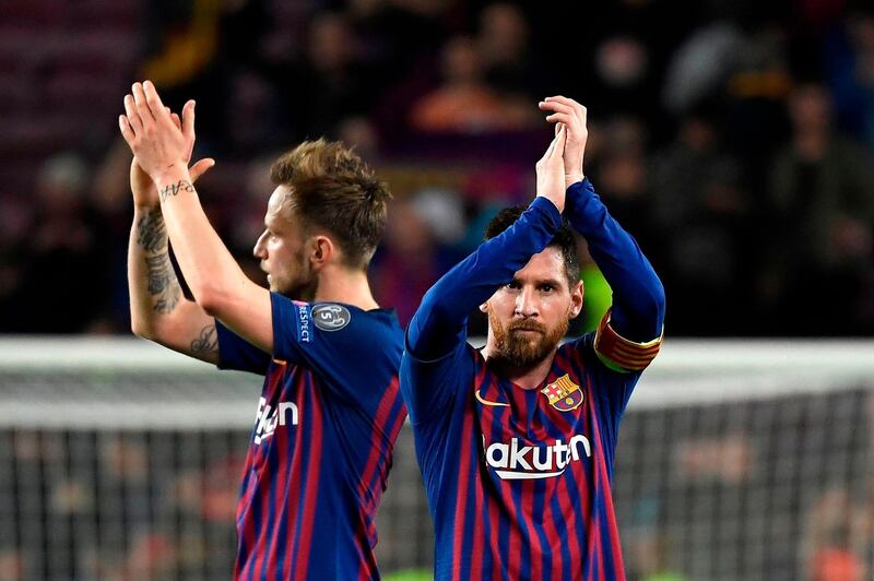 Lionel Messi and his teammates celebrate at the end of the game. Lluis Gene / AFP