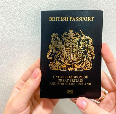 A handout picture released on February 21, 2020 by the UK Home Office press office shows a model holding a new blue United Kingdom passport. Britain will issue blue passports next month for the first time in almost three decades following its departure from the European Union, the government said on Saturday.
 - RESTRICTED TO EDITORIAL USE - MANDATORY CREDIT "AFP PHOTO / UK HOME OFFICE" - NO MARKETING NO ADVERTISING CAMPAIGNS - DISTRIBUTED AS A SERVICE TO CLIENTS


 / AFP / UK HOME OFFICE / STRINGER / RESTRICTED TO EDITORIAL USE - MANDATORY CREDIT "AFP PHOTO / UK HOME OFFICE" - NO MARKETING NO ADVERTISING CAMPAIGNS - DISTRIBUTED AS A SERVICE TO CLIENTS


