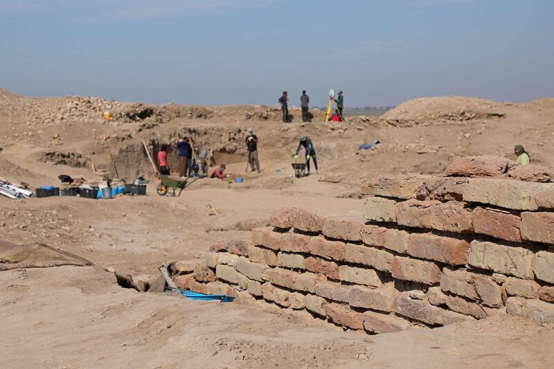 When the archaeological team arrived in 2021, they found Girsu pockmarked, with depressions in the soil where looters dug up items. AFP