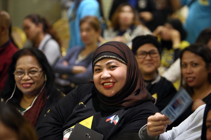 Members of the Filipino community working and residing in Kuwait attend a meeting with their country's Labour Department Undersecretary for Workers Protection, Human Resource, and Internal Auditing Services Cluster, at the Philippines' Embassy in Kuwait City, on February 24, 2018.
The employers of the murdered 29-year-old Filipina maid Joanna Demafelis, whose body was found dead in a freezer in Kuwait, were both arrested in the Syrian capital Damascus, a Lebanese judicial official said on February 24.
The murder had sparked outrage in the Philippines and prompted President Rodrigo Duterte to impose a departure ban for Filipinos planning to work in Kuwait. / AFP PHOTO / YASSER AL-ZAYYAT