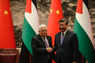 Palestinian President Mahmoud Abbas shakes hands with China’s President Xi Jinping after a signing ceremony at the Great Hall of the People in Beijing on June 14, 2023. Getty